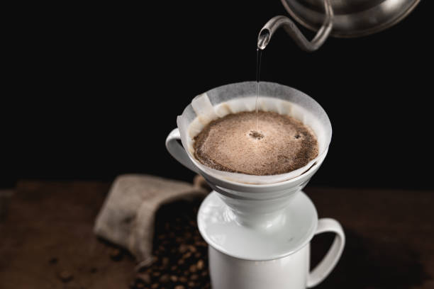 istock Drip coffee - Black coffee poured into a glass in the morning 1205178939