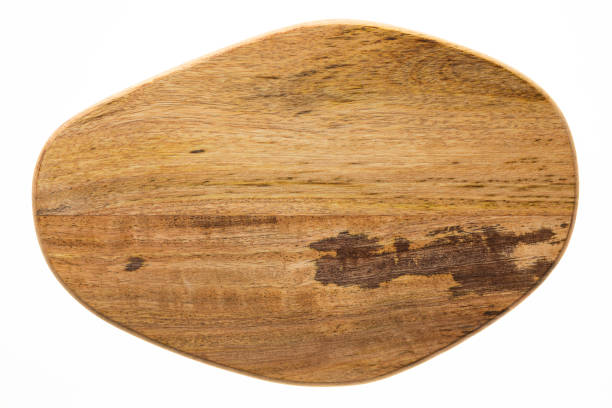 istock Small wooden chopping board. Splicing wooden cutting board. Chopping board background texture element. 1205181862
