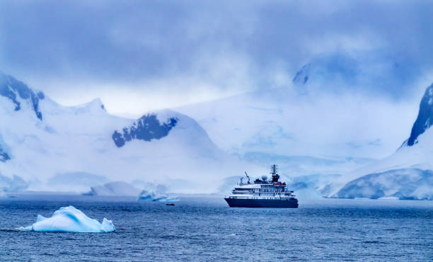 istock Ship Mountains Glaciers Charlotte Harbor Antarctica 1205182869