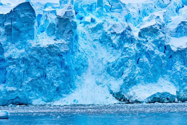 istock Snow Mountains Blue Glaciers Charlotte Bay Antarctica 1205183741