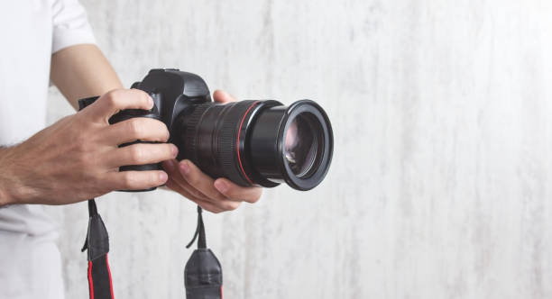 istock Photographer with a Camera. Lifestyle, Work 1205186000