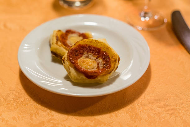 istock strawberry danishes on white plate. 1205191488
