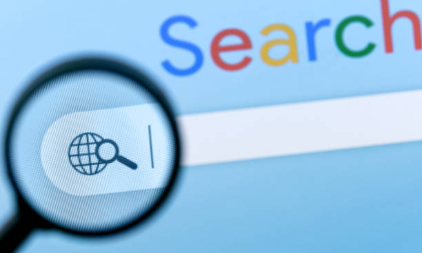 Internet search bar in browser with magnifier on computer monitor screen. Internet browser search bar with magnifier on computer screen with text Search search engine photos stock pictures, royalty-free photos & images