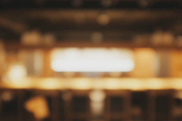 istock Background blurred Modern cafe with worm light , cafe blurred background with bokeh 1205195397