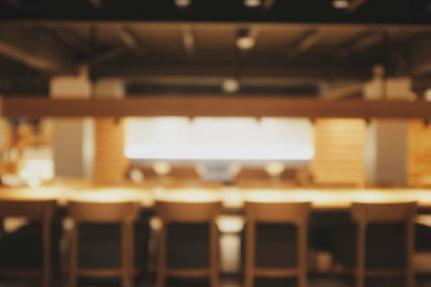 istock Background blurred Modern cafe with worm light , cafe blurred background with bokeh 1205195484