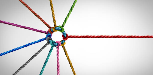 Team Joining Concept Team joining concept and unity or teamwork concept as a business metaphor for partnership as diverse ropes connected together as a corporate network symbol for cooperation and working collaboration. hardy stock pictures, royalty-free photos & images
