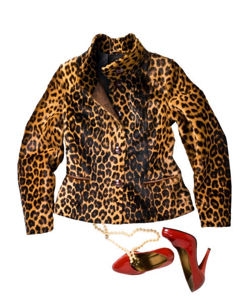 Leopard printed suede jacket with red high-heels and pearl necklace