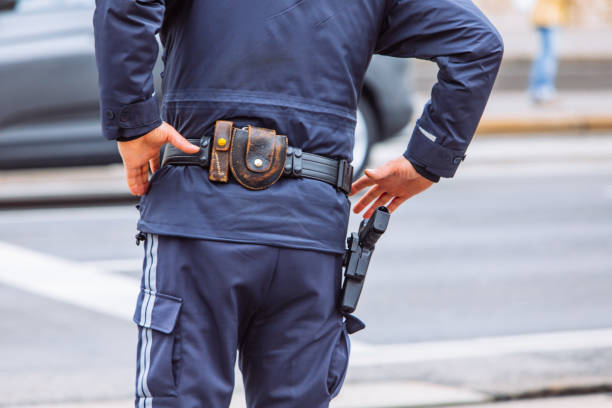 istock ammunition belt on policeman waist 1205203451