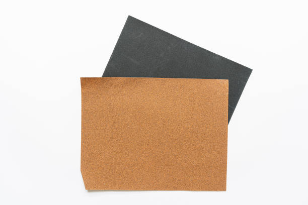 istock Grinding paper for sander closeup, isolated on white background 1205208481