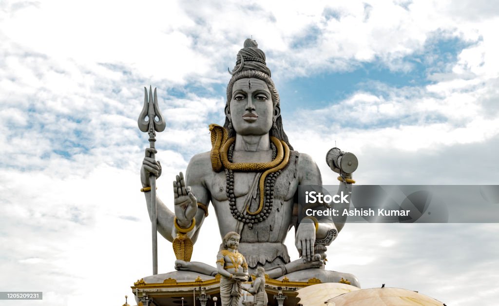 Very Famous And Among The Tallest Statue Of Lord Shiva Meditating In Lotus  Pose With Trident Drum In Hand Snake Around Neck While Giving Blessings To  His Followers Stock Photo - Download