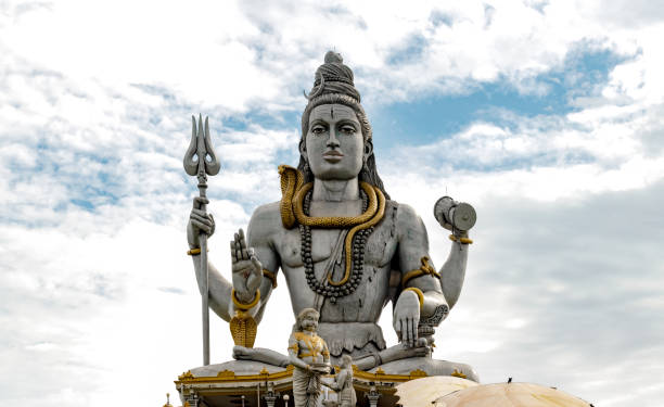 very famous and among the tallest statue of lord shiva, meditating in lotus pose with trident, drum in hand, snake around neck while giving blessings to his followers. - shiva posture imagens e fotografias de stock