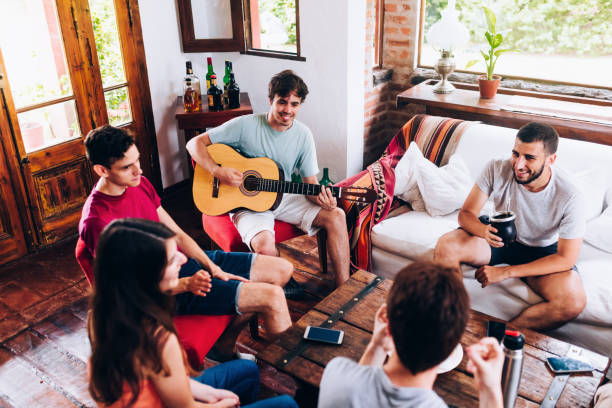 istock Young friends having music time together 1205213277