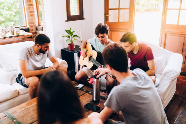 istock Young friends having music time together 1205213504
