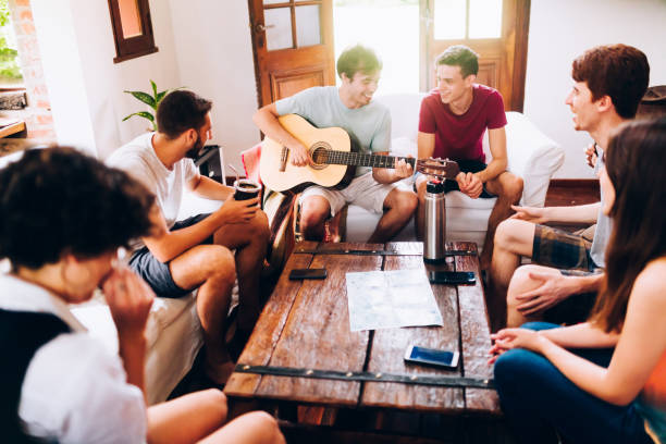istock Young friends having music time together 1205213522