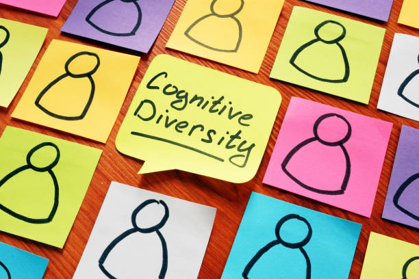 istock Cognitive Diversity and drawn figures on the pages. 1205213906