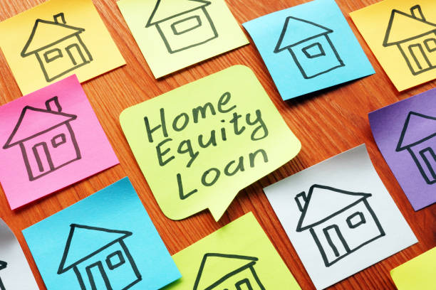 A collection of sticky notes with houses and a unique one with home equity loan