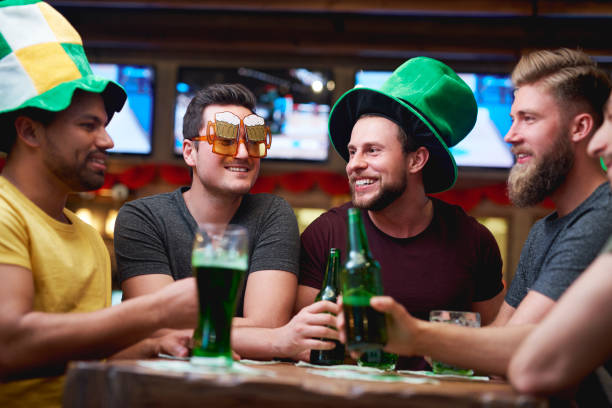 istock Group of friends spending time together in the pub 1205220855