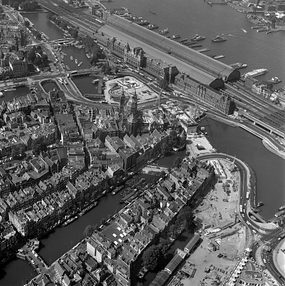 Amsterdam, Holland,July 12- 1977: Historical aerial photo of the Central Station Amsterdam, Holland in black and white