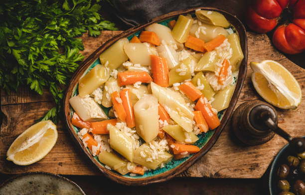 Turkish traditional leek, rice and carrot meze dish on board stock photo