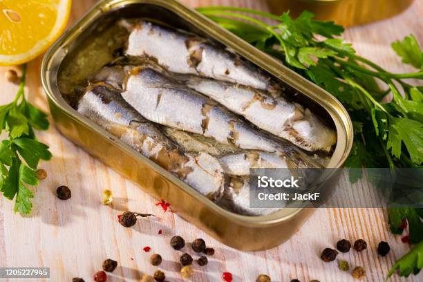 Open Can Of Sardines On Table Stock Photo - Download Image Now - Sardine, Can, Fish