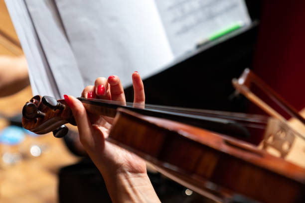 istock Hand girl playing the violin 1205230140