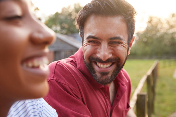 istock Romantic Couple Taking A Break And Resting On Fence During Walk In Countryside 1205230697
