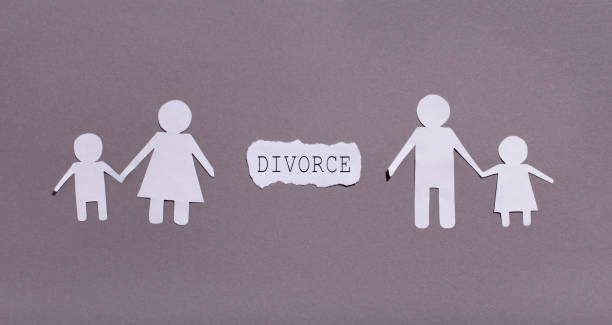 istock Family divorcing and separating children on gray 1205231951