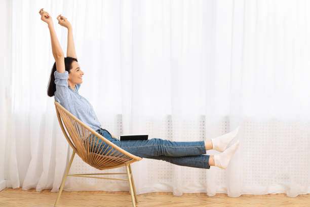 istock Girl having rest at home with a book 1205232294