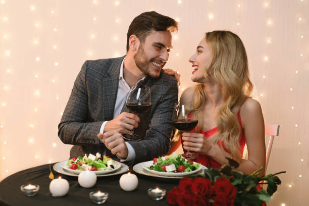 istock Loving Couple Enjoying Romantic Date In Restaurant 1205235160
