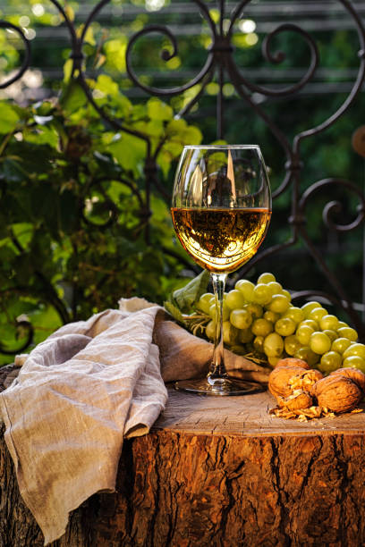 Amber wine in the glass. Georgian national wine according to old technology. stock photo