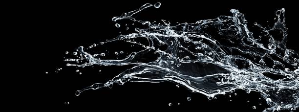 istock Abstract splashes splashing in the dark 1205238116