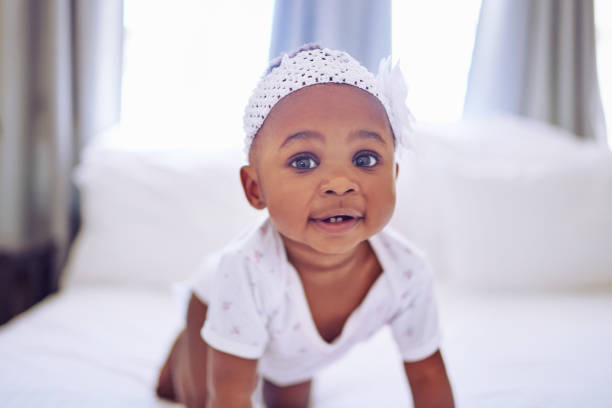 istock This sweet little one is always ready to have some fun 1205238437