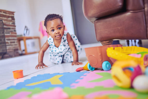 istock Crawling to all her favourite toys 1205238978