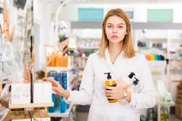 istock Female druggist working in pharmacy 1205239093