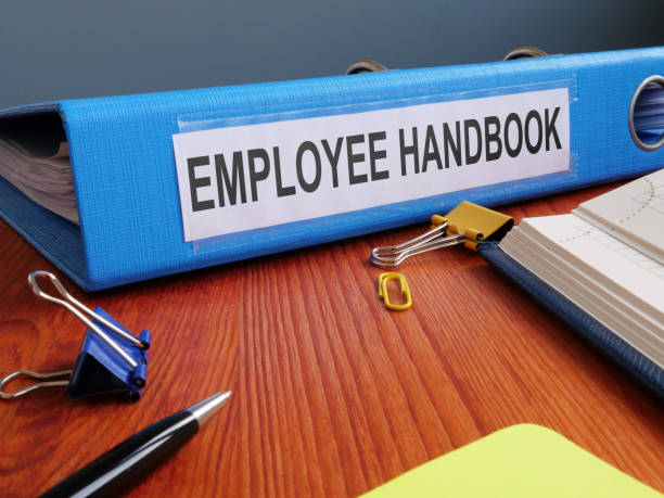 text sign showing the printed words employee handbook - occupation handbook human resources recruitment imagens e fotografias de stock