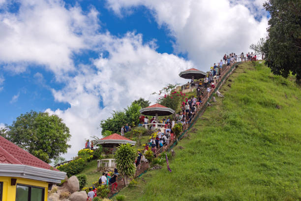 Many people tourists visit Chocolate Hills Bohol, Philippines - January, 27, 2020: Many people tourists visit Chocolate Hills chocolate hills photos stock pictures, royalty-free photos & images