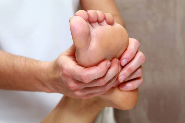 istock Patient receiving foot massage. 1205245688