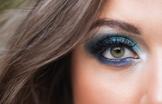 Woman eye with make up, close up.