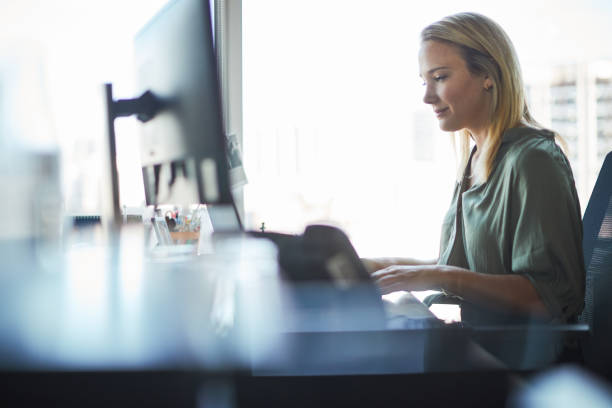istock Businessperson working on the computer in an office. 1205248132