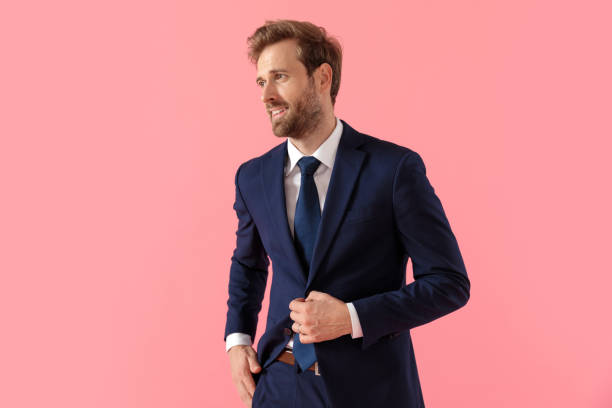 istock Confident businessman adjusting his jacket, looking away 1205251994
