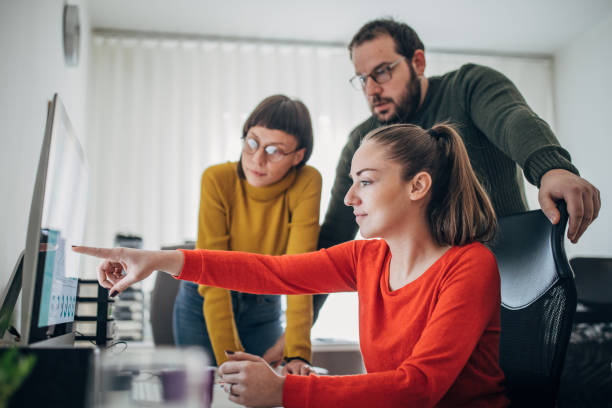 istock Small group of people in the office working 1205252457