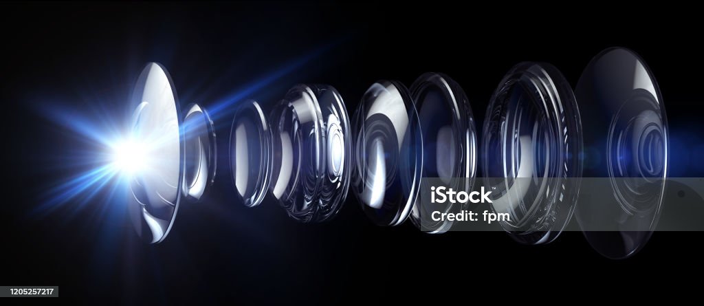 Optical Lens System Lens system illustration. Rendered with the highest fidelity to capture all the relflections and refractions as light travels through the various lenses. Lens - Optical Instrument Stock Photo