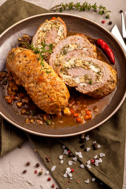 istock Baked meat rolls in a thick vegetable sauce. 1205257435