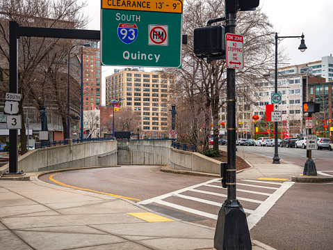 Highway entrance near Boston's Chinatown, including a directional sign for I-93 South to Quincy Massachusetts
