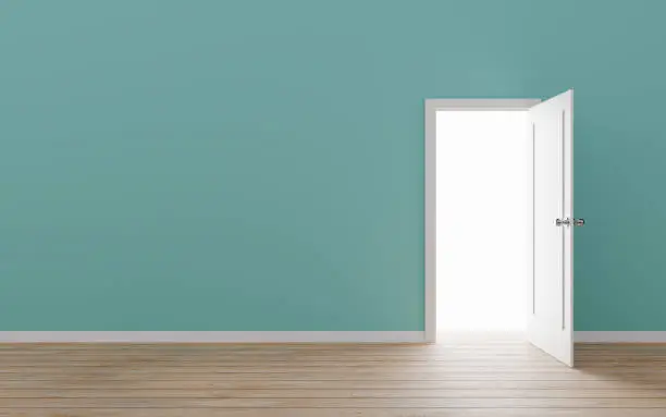 Photo of Opened door with blue wall