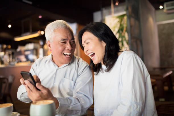 istock Smiling with loved one over coffee 1205259790
