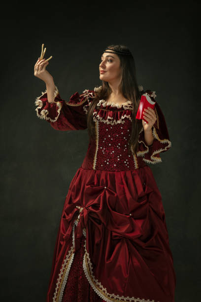 istock Medieval young woman in old-fashioned costume 1205259995