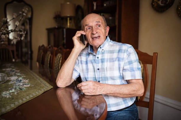 istock Senior man taking to phone 1205261342