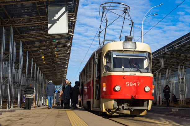 Kiev, Ukraine - February 04, 2020: The tram stopped for boarding and disembarking passengers at the restored station.