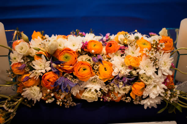 istock Flowers in a banquet hall 1205264560